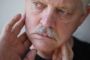 man with fingers on painful jaw picture id507876319