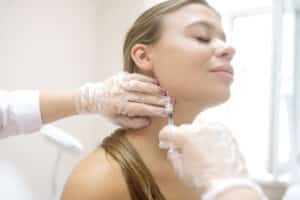 Woman getting masseter BOTOX in McLean, VA